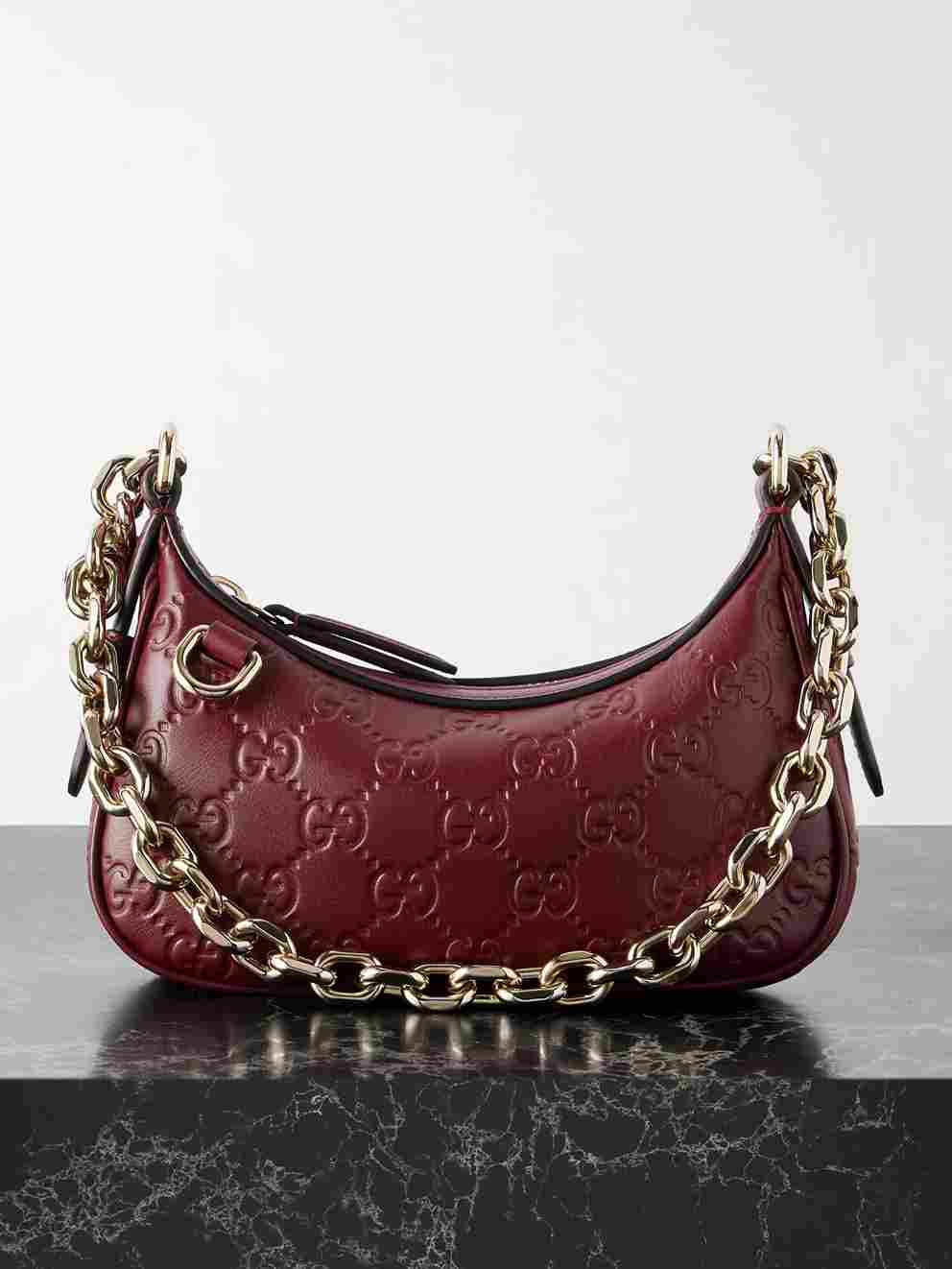 Gucci Emblem Debossed Leather Shoulder Bag - GGTX002